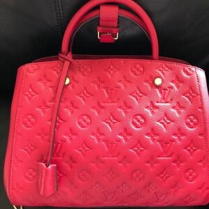Authentic Fuschia Louis Vuitton Montaigne MM bag